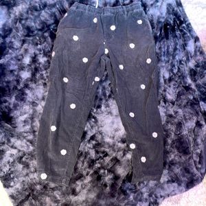 dark blue cords, dice pattern, bleach spot on back pocket